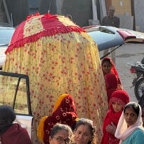 IMG_6532 The wife of the prince (the princess) is covered as she is not to be looked at during temple visits.